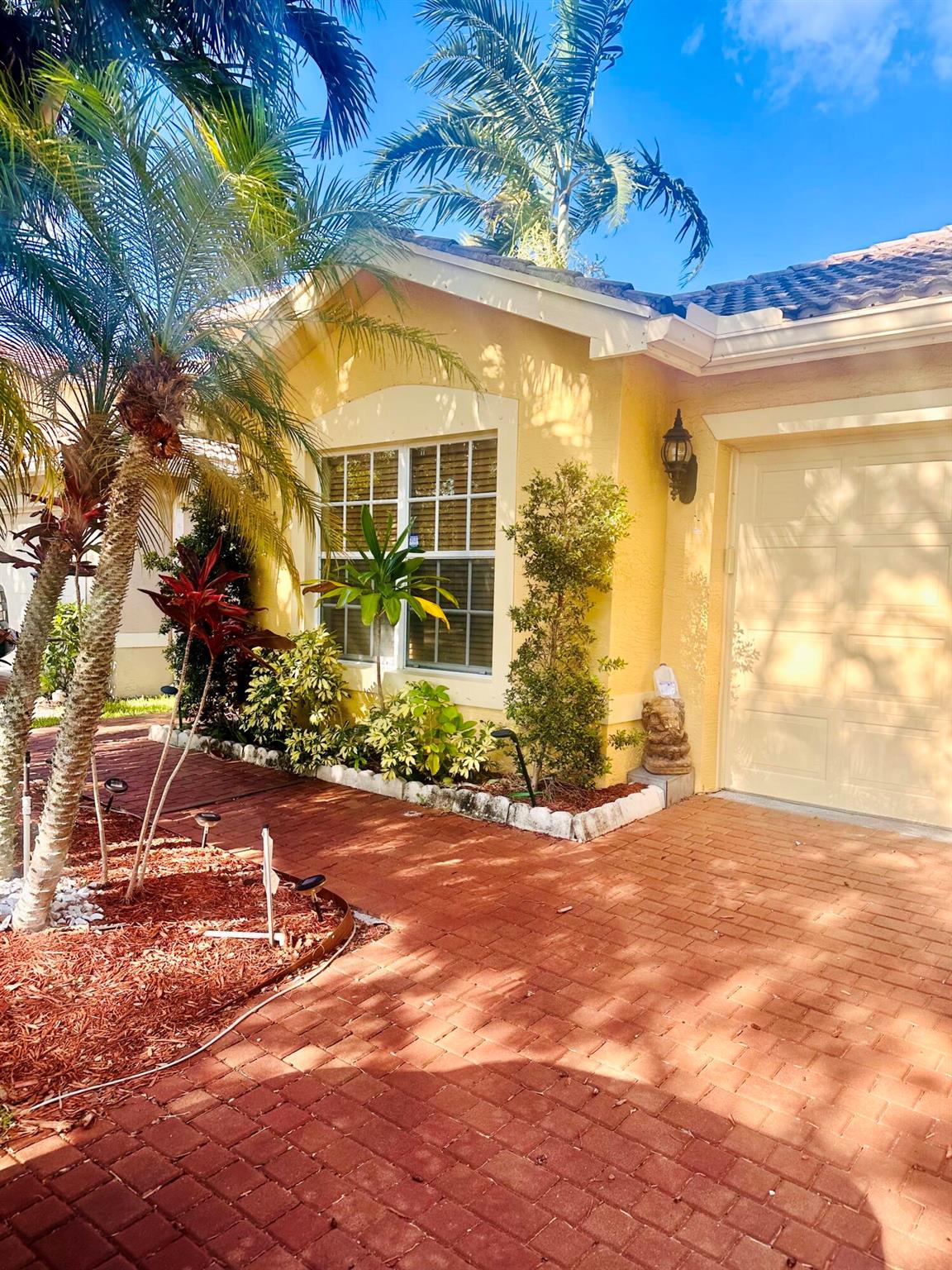 Location! Location! Location! Come see this Spectacular home in a very desirable gated community Nautica Isles. The home boasts 3 bedrooms, 2 baths with a 2 car garage. Large master bedroom, with walk in closet and a bathroom that has a his and hers sink. The vaulted ceiling in the family room with sliding glass door leads to an island oasis of a patio where you can sit back and relax to the soothing sound of your walled in waterfall and exotic fruit trees!! You will fall in love with this home.