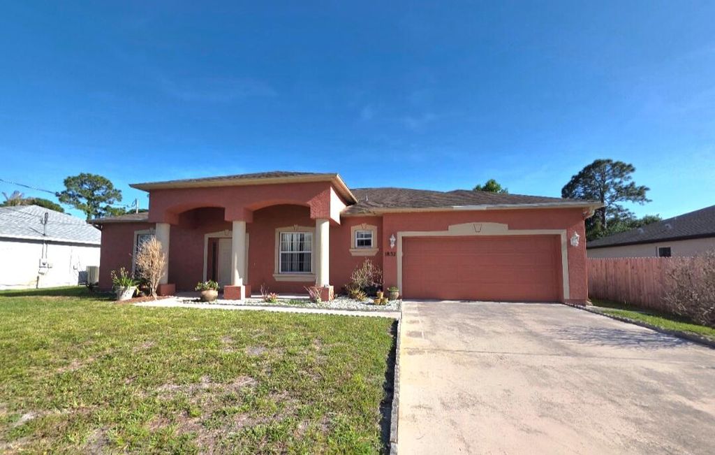 Photo of 1852 SW Janette Avenue, Port Saint Lucie, FL 34953 (MLS # B26025292)