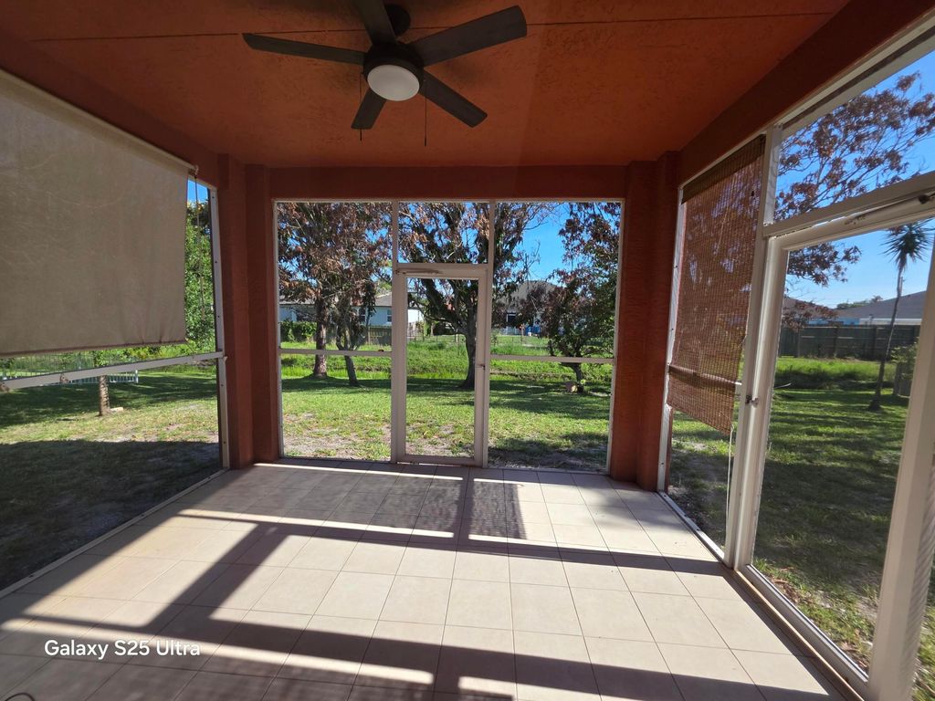 Photo of 1852 SW Janette Avenue, Port Saint Lucie, FL 34953 (MLS # B26025292)