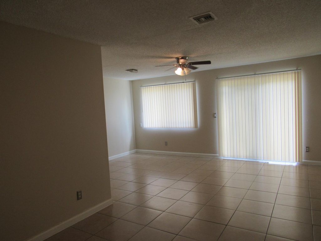 Photo of 5005 Pier Drive, Greenacres, FL 33463 (MLS # R11048988)