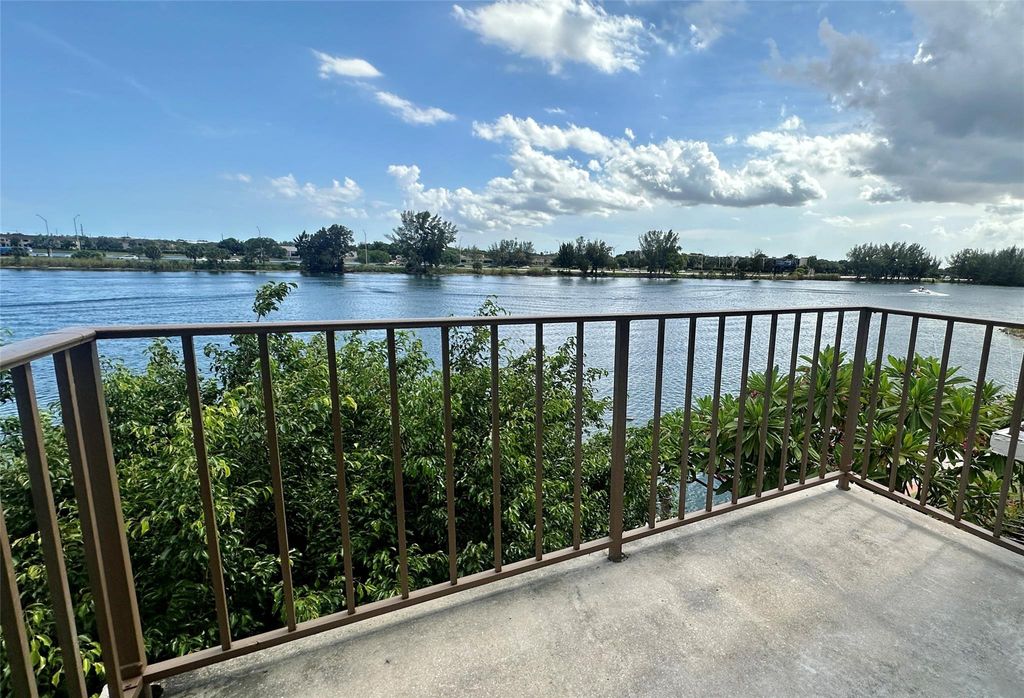 Photo of 1100 Crystal Lake Drive #210, Deerfield Beach, FL 33064 (MLS # F10513347)