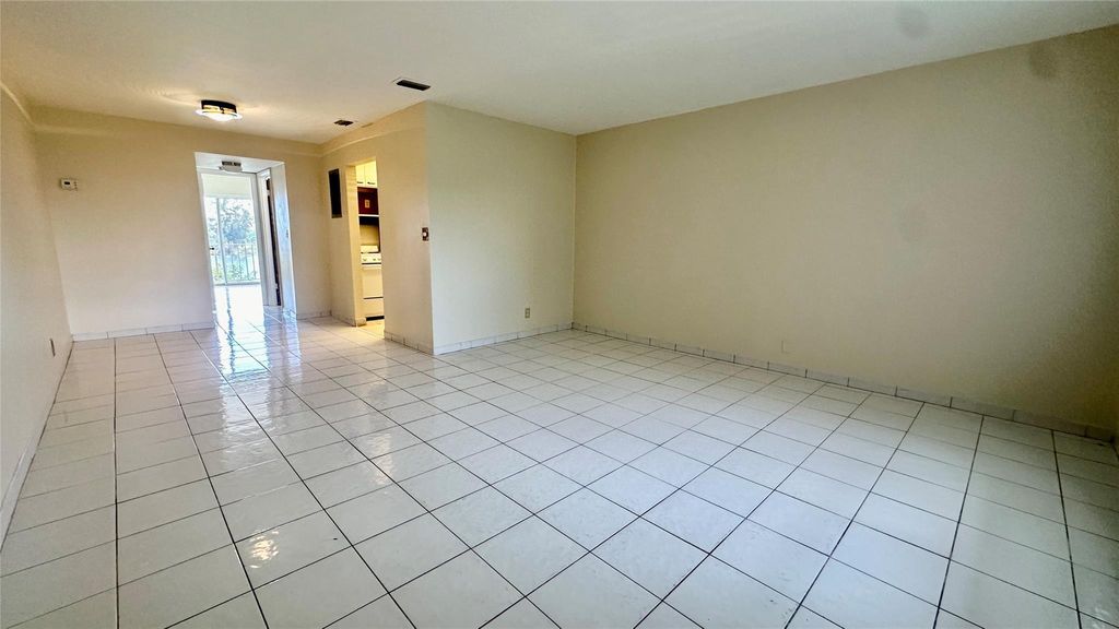 Photo of 1100 Crystal Lake Drive #210, Deerfield Beach, FL 33064 (MLS # F10513347)