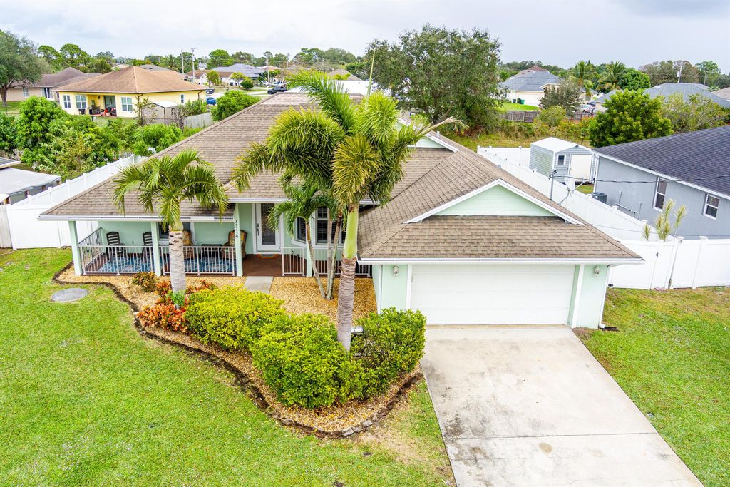 Photo of 3725 SW Wycoff Street, Port Saint Lucie, FL 34953 (MLS # R11047488)