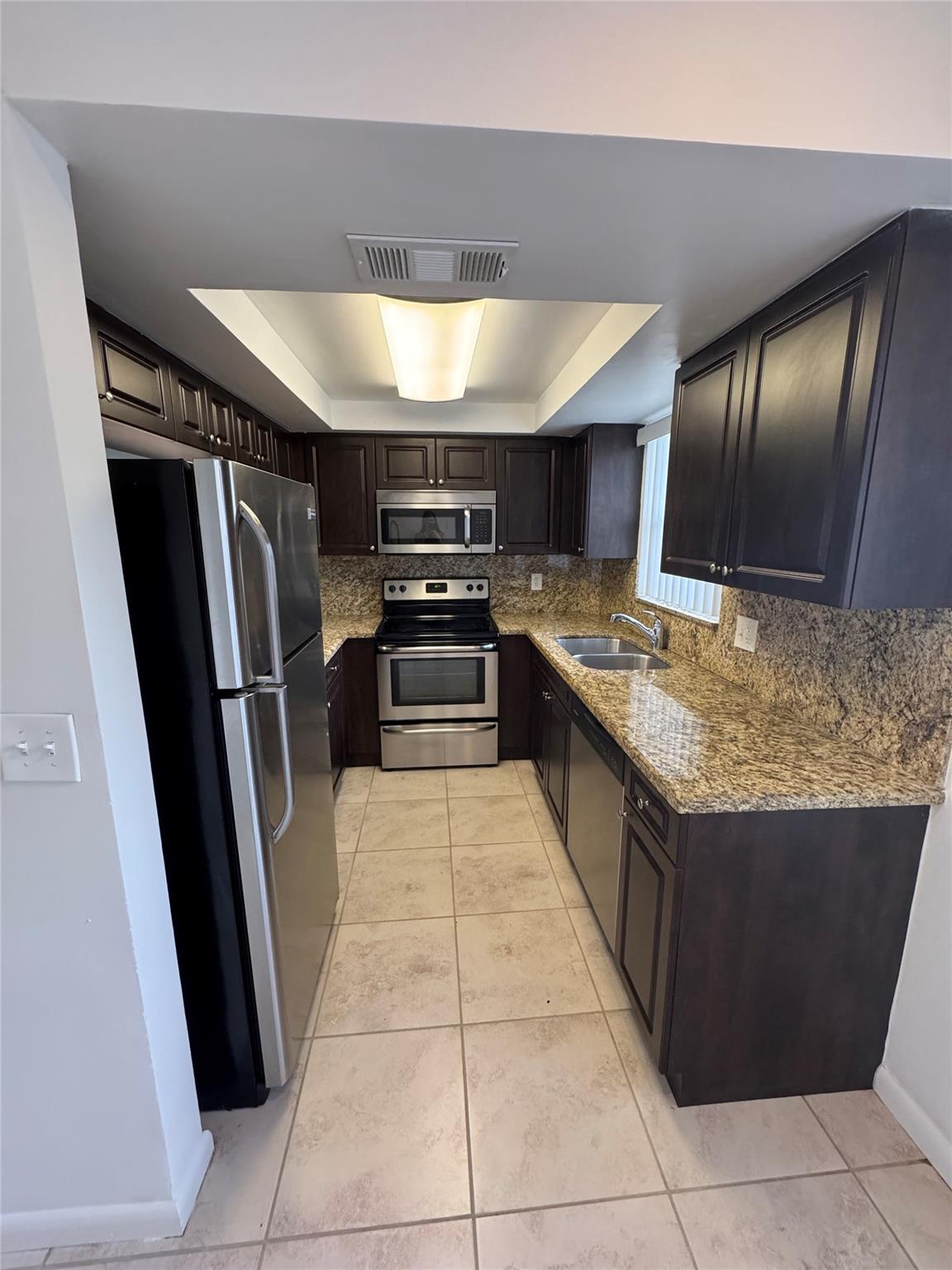 Renovated 2/2 in the heart of Coral Springs. Tile throughout, remodeled kitchen & bathrooms. Stainless steal appliances and in-unit washer/dryer, 2nd floor access - community pool , 2 assigned parking spots. Great Schools!!! Show & Rent.