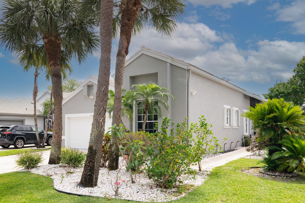 Photo of 6400 Three Lakes Lane, Boynton Beach, FL 33437 (MLS # B26019396)