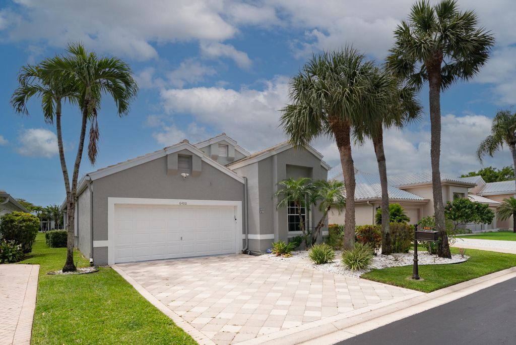 Photo of 6400 Three Lakes Lane, Boynton Beach, FL 33437 (MLS # B26019396)