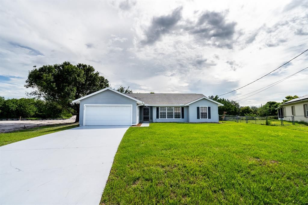 Photo of 3794 SW Hale Street, Port Saint Lucie, FL 34953 (MLS # R10728569)