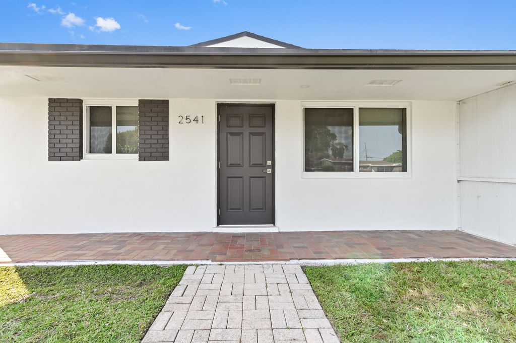 Photo of 2541 NW 64th Terrace, Margate, FL 33063 (MLS # B26023327)