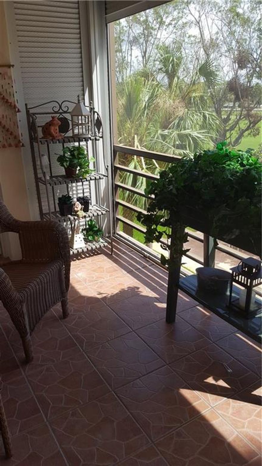 Beautiful 2 bedroom 2 bath tiled thru-out neutral colors and very well maintain. Newer bathrooms and new white kitchen cabinet with pantry cabinet.  Property is completely fenced and surrounded by Pembroke Lakes Golf course. 24/7 gated security. Master bedroom has sitting area and also door to screen patio. Master has 2 closets and 1 walk-in.  Second bedroom has two good size closet and sitting area also. 55 Adult Community 20% Min  Down