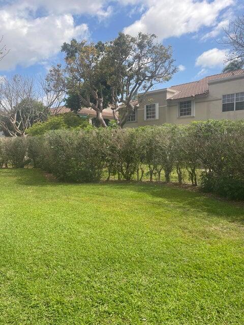 Updated 2/2 condo in plums of Boca Pointe.Tiled floors throughout. New kitchen withstainless steel appliances, quartz countertopsand white cabinets. Glassed enclosed porch can be easily used for additional space. Walking distance to the pool .