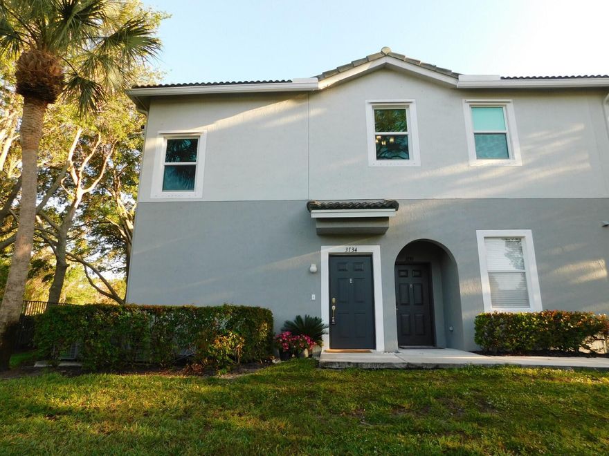Beautiful 3 Bedroom Condo with a garage for rent. This is a 2nd floor unit with a garden view. The first floor has a small foyer and the 1 car garage. The 2nd floor has laminate floors throughout and tile in the kitchen and bathrooms. This corner unit is light and bright and offers an open balcony with a garden view. The kitchen has 42'' cabinets and stainless steel appliances. The rent includes water, sewer and trash. This gated community offers a pool.
