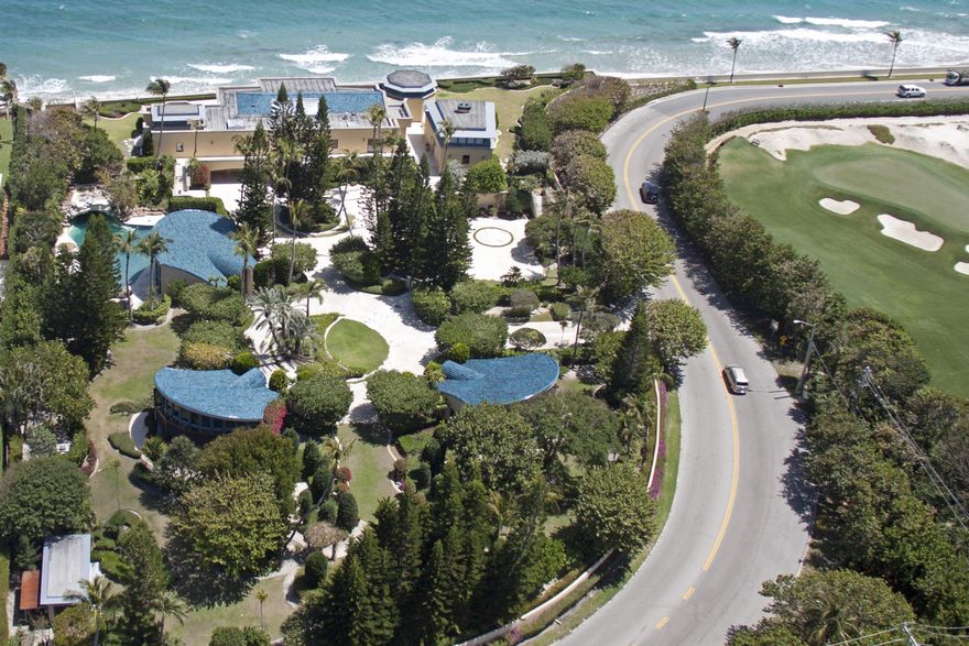 Rare opportunity to own 300' of Direct Palm Beach Oceanfront on a 2.3 acre unique and special property. Very high elevation, unique and mature trees and landscaping.