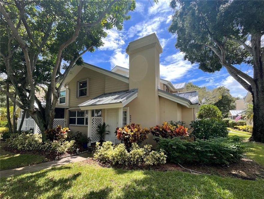 Look no further!! This beautiful 3 bedroom 2 bathed townhouse is in a charming tree-lined community of Wellesley in Boynton Beach.  This Corner, private entrance property, is facing a serene lake.  You enter into the large great room with vaulted ceilings and lots of windows and a skylight which brings in the natural light. The kitchen has natural stone countertops, tile backsplash, stainless steel appliances, washer/dryer, and tile thru-out the first floor. The first floor has tile thru out including 3rd bedroom. New metal roof installed in 2019, new gutter system installed, accordion hurricane shutters and newly updated downstairs full bath. Enclosed patio provides an additional living space. Laminate wood flooring covering stairs and both master and second bedrooms upstairs.