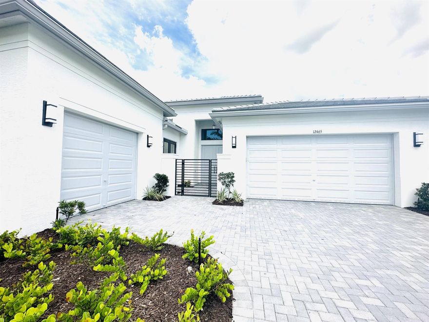 Welcome to your dream home in Valencia Walk! This stunning water view Elena model boasts 3 bedrooms, 2.1 baths, and a spacious 3-car garage, all situated on a coveted lakefront lot. As you step inside, you'll be greeted by an impressive gourmet kitchen and open concept living space, enhanced by elegant tile throughout. Enjoy resort-style living with a spectacular 34,000 sq. ft. clubhouse, featuring an arts & culture center, a sports & racquet club with over 68 courts for tennis and pickleball, and 5 aerobic studios. Stay fit and active with a state-of-the-art fitness facility, complete with one indoor and four outdoor pools. Take leisurely strolls or bike rides along the paseo greenway and participate in a variety of social events year-round.
