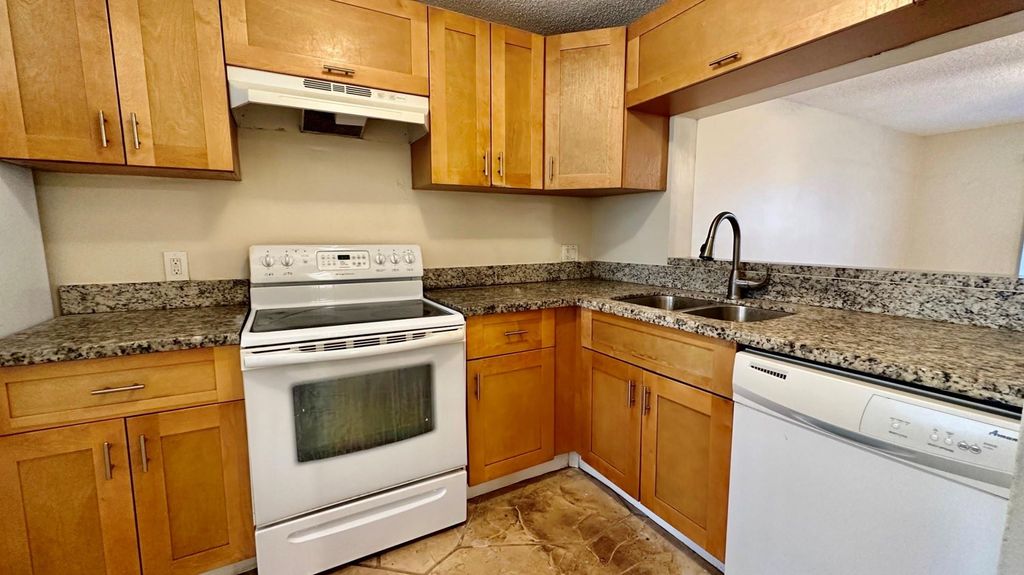 Photo of 1441 NW 94th Way, Coral Springs, FL 33071 (MLS # B26014299)