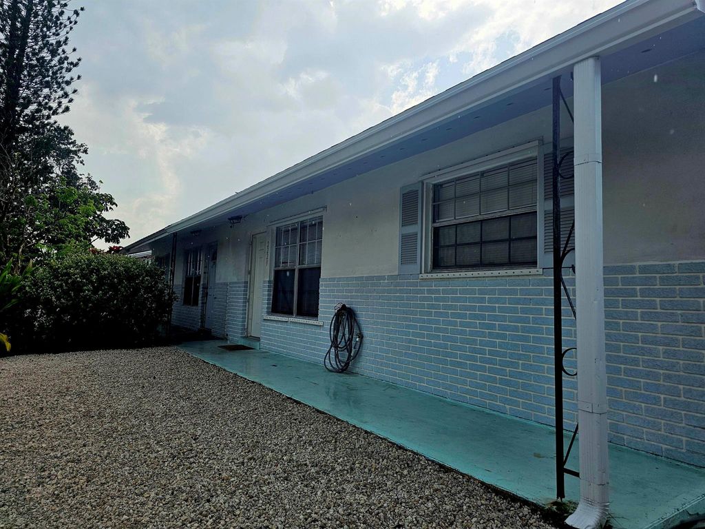 Photo of 2229 NE Rustic Way, Jensen Beach, FL 34957 (MLS # R10982437)