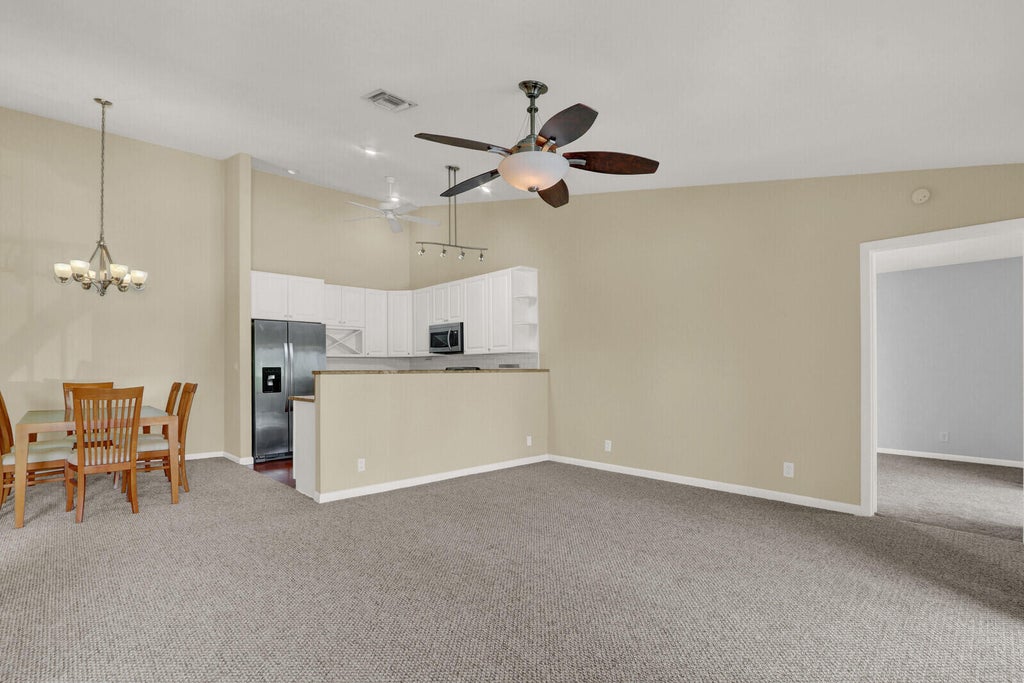 Photo of 6563 Chasewood Drive #F, Jupiter, FL 33458 (MLS # B26051696)