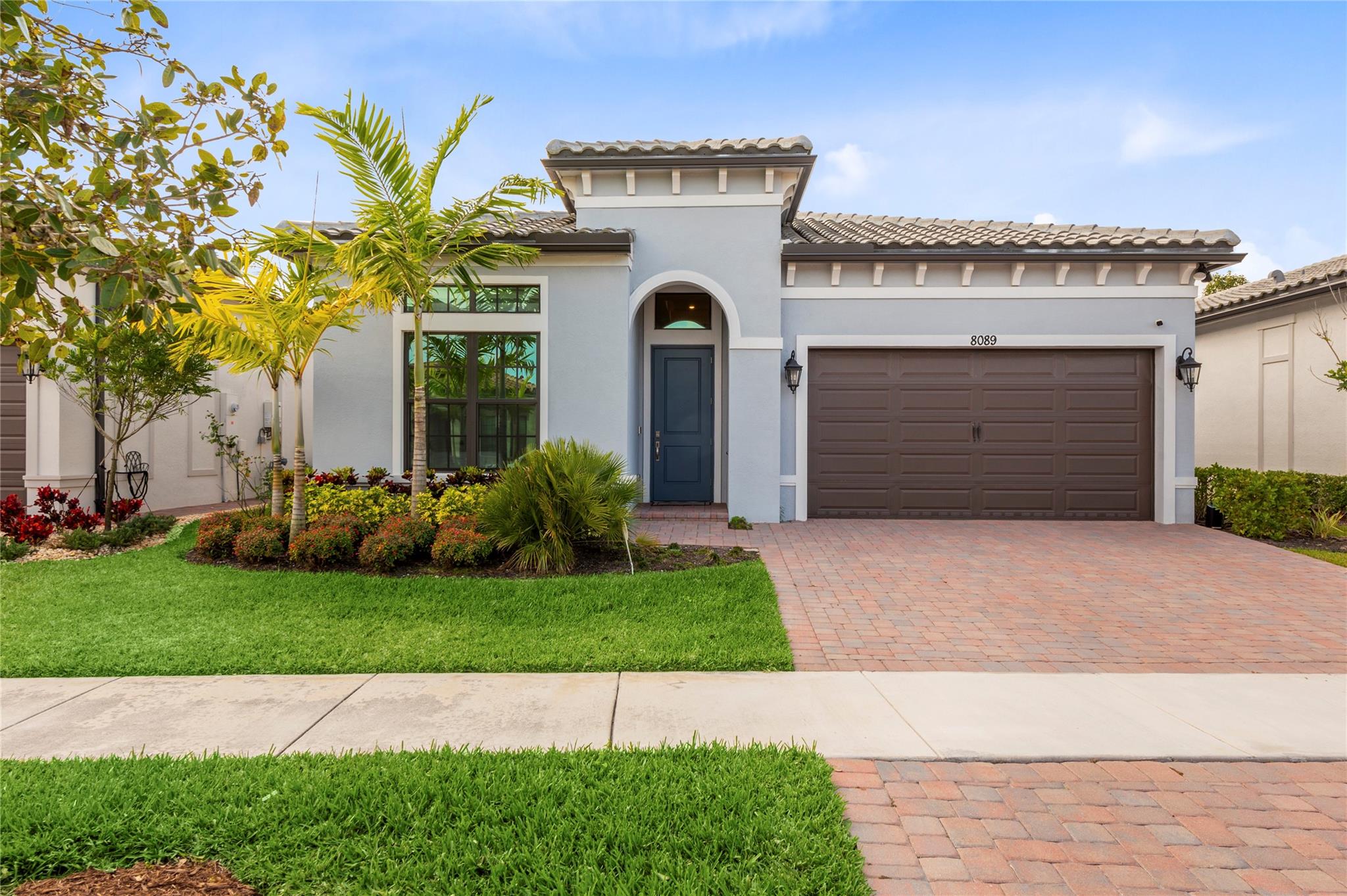 Gorgeous, nearly new single-family home in The Falls at Parkland, a gated 55+ resort-style community with low-maintenance living!! The Sabal Grande Single Family Home offers 2 beds, 2 baths, PLUS a den/office/flex space. Gourmet kitchen with a walk-in pantry, white shaker cabinets, and a large island providing plenty of space for showing off your culinary skills. Owner’s suite boasts dual sinks, and walk-in closet. Motorized screens on the sliding glass door & patio screen outside, a large fenced yard for pets, water softener, and hurricane-impact windows & doors complete this elegant home. Enjoy a 24,000 sq. ft. clubhouse featuring a theater, card rooms, billiards, ballroom, lounge, on-site café, fitness center, resort-style pool, spa, outdoor kitchen, bocce and pickleball!!