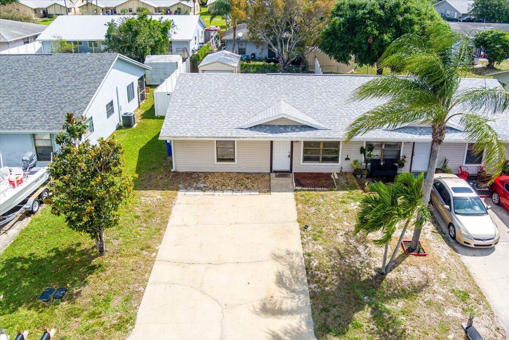 Photo of 8995 SE Sandy Lane, Hobe Sound, FL 33455 (MLS # R11079572)