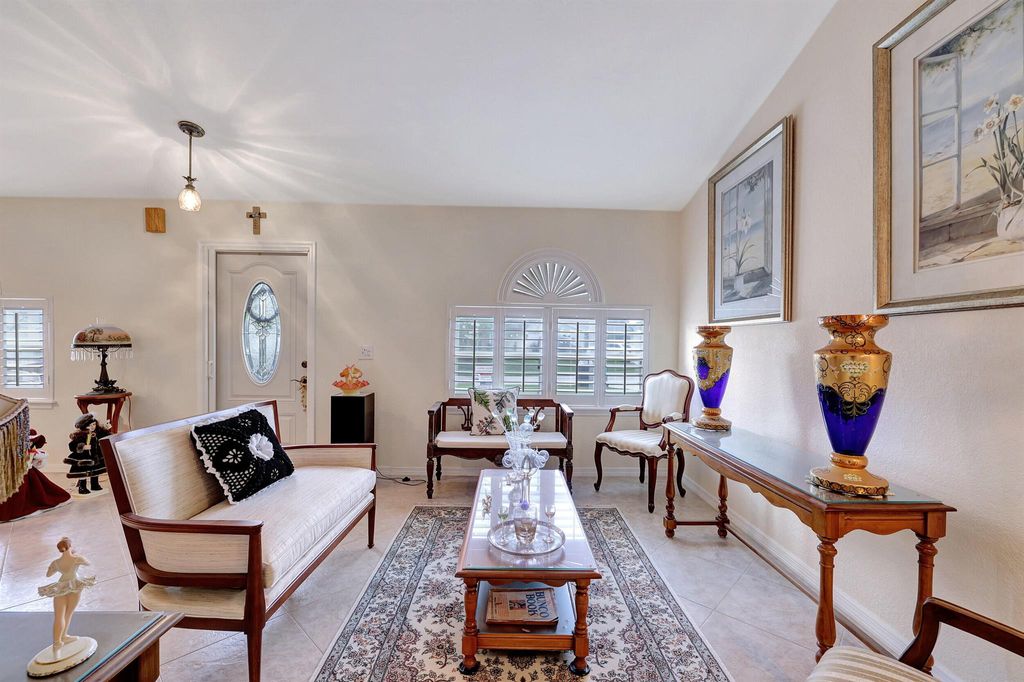 Photo of 2445 SW Falcon Circle, Port Saint Lucie, FL 34953 (MLS # R10967741)