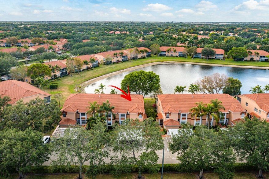 1st floor condo with carport and storage room located in the manned gated community of Palm Isles in central Boynton Beach. Beautiful lake views from the tiled and glassed patio.  2 bed plus den, approximately 1600 liv sqft.  Amazing amenities with 50,000 sqft clubhouse, 600 seat theatre, CAFE serving breakfast and lunch, indoor AND outdoor pool, 8 Har-Tru tennis courts, 3 pickleball courts, FITNESS, Billiards, Library, Sauna.  Dozens of clubs! Association fee INCLUDES: cable,water,internet, lawn, insurance.  Pet ok, 35 lb weight limit, no pit bulls