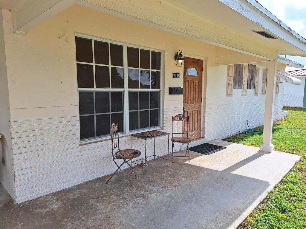 Photo of 2596 Rosehaven Road, West Palm Beach, FL 33415 (MLS # R11146274)