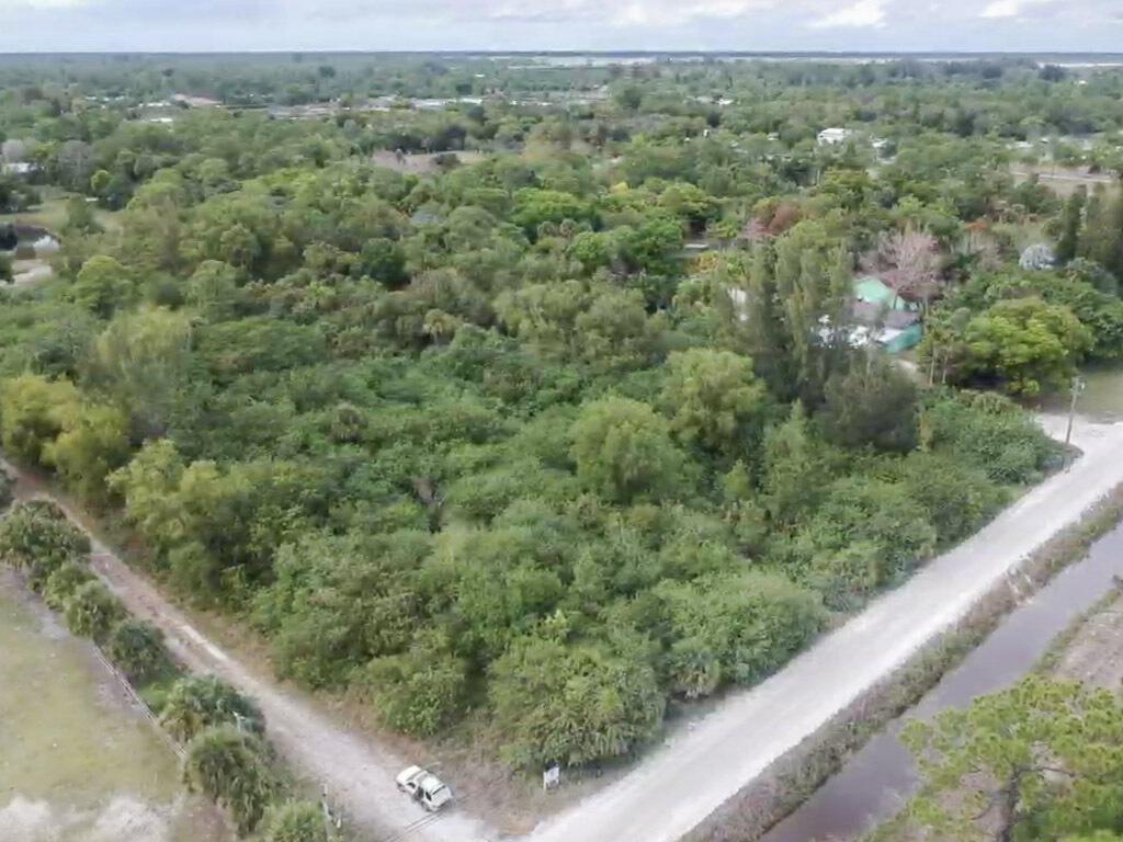 Beautiful high and dry lot, not too far off the newly paved section of E road. Property has well over 400 loads of fill on it already! Was fully cleared about 10 years ago but a lot grew back as it sat.