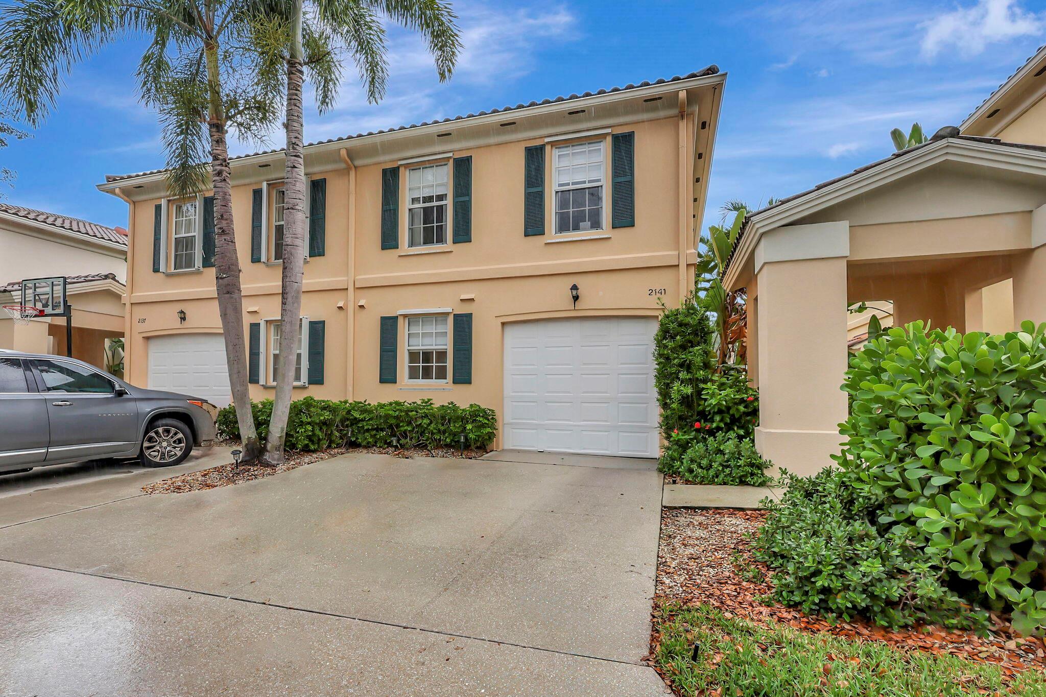 Beautifully updated 3 bedroom 2 bath townhouse with 1 car garage in Riverwalk in West Palm Beach! Wood-look tile floors throughout, gourmet kitchen with white marble countertops, fenced yard with open patio, custom lighting, all white paint, end unit that is full of light and bright. Community offers 3 pools, tennis, pickleball, gym, clubhouse space, walking paths and more. HOA fee includes internet and WiFi! Quick access to I95, Turnpike, Palm Beach Airport the areas best beaches. A short drive to lively downtown West Palm Beach, Palm Beach Island, great restaurants. See it today!