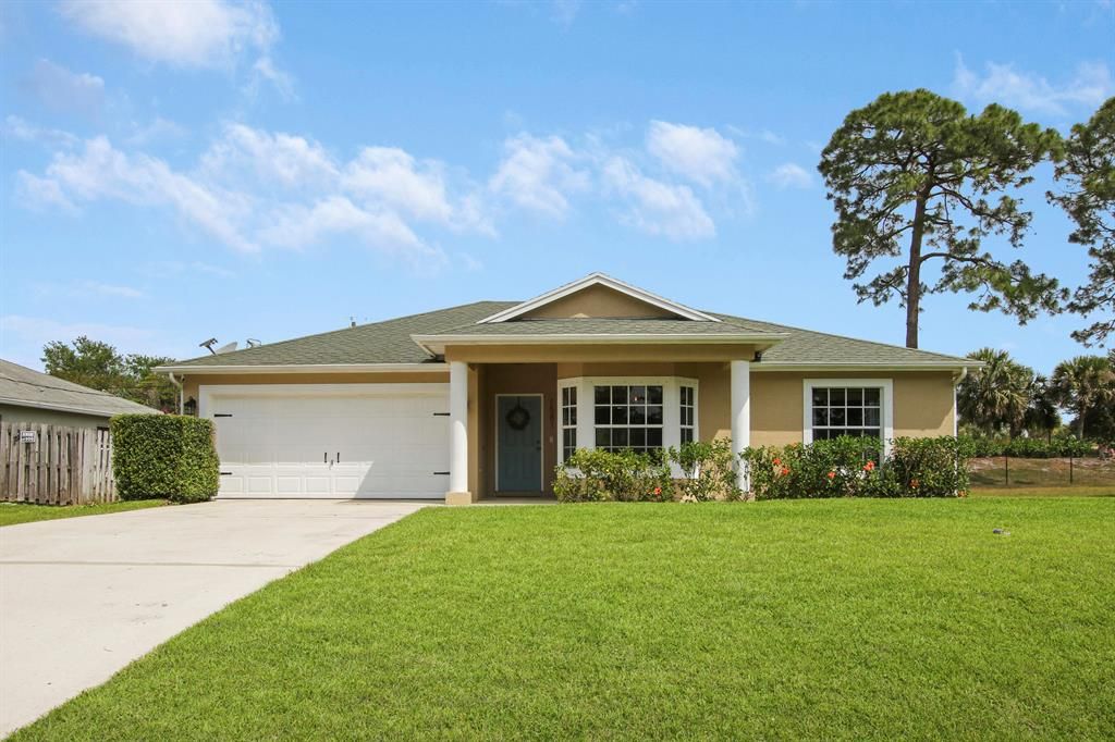 Photo of 1581 SW Janette Avenue, Port Saint Lucie, FL 34953 (MLS # R10704381)