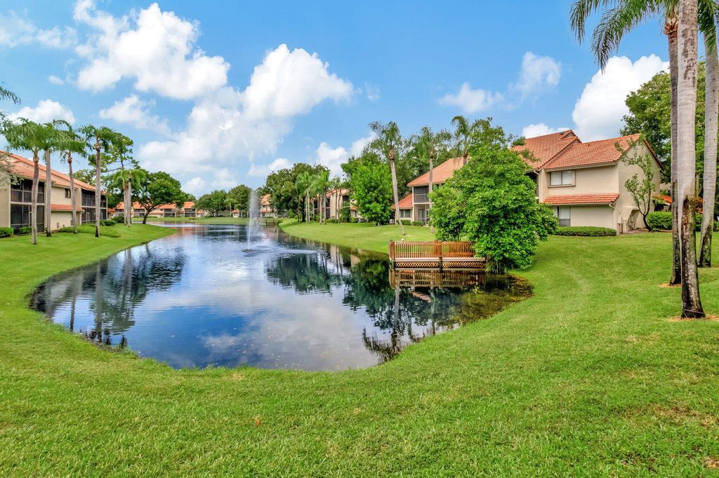 Photo of 5731 Coach House Circle #A, Boca Raton, FL 33486 (MLS # R11168886)