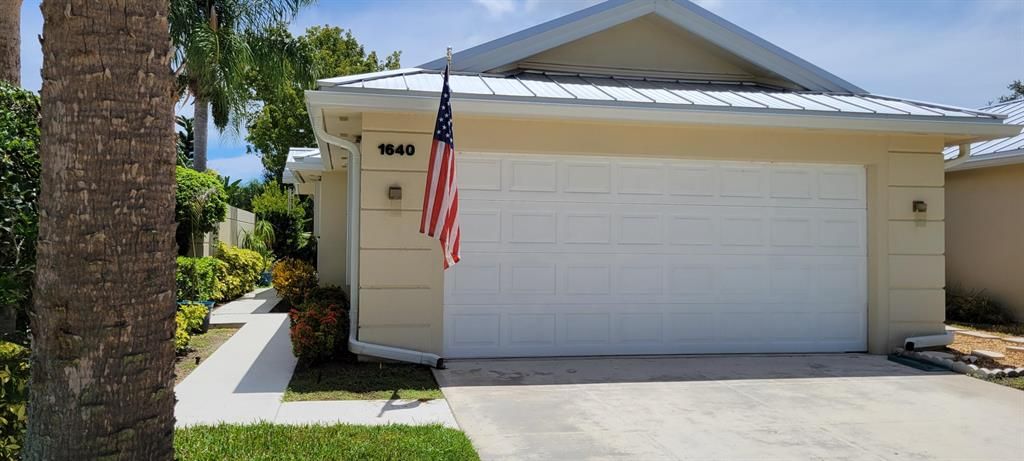 Photo of 1640 SW Waterfall Boulevard Blvd, Palm City, FL 34990 (MLS # R10823201)