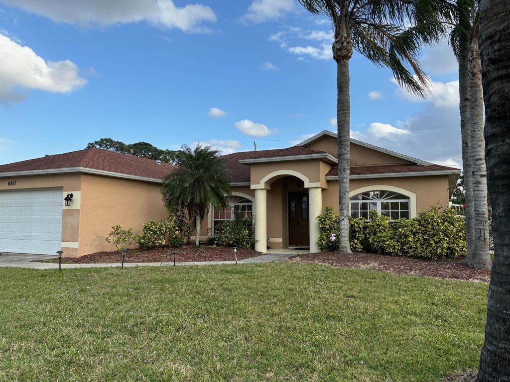 Photo of 6867 NW Brookhaven Avenue, Port Saint Lucie, FL 34983 (MLS # R11067367)