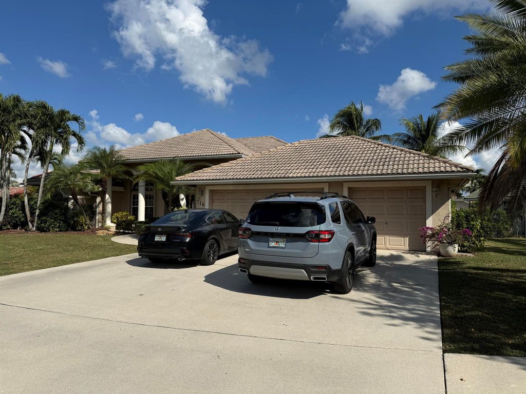 Photo of 216 Cypress Trace, Royal Palm Beach, FL 33411 (MLS # R11143560)