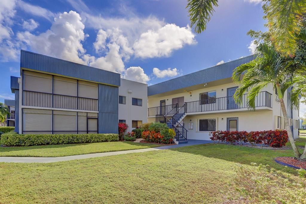 Photo of 15036 Ashland Lane Ln #57, Delray Beach, FL 33484 (MLS # R10693358)