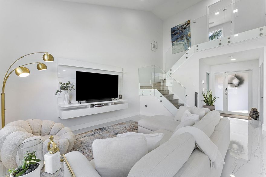 Discover this beautifully updated 5-bedroom, 3.5-bath home in Sawgrass Mills area of Sunrise, offering style and comfort throughout. This spacious residence features bright living areas, abundant natural light, and tasteful upgrades. The modern kitchen showcases stainless steel appliances, sleek finishes, and ample space for cooking and entertaining. The primary suite offers a peaceful retreat with updated bathrooms featuring contemporary details. Step outside to a private backyard with a paved patio and manicured landscaping, perfect for relaxing or hosting guests. Located in a well-kept community near Volunteer Park, shopping, dining, schools, major highways, and Sawgrass Mills. No HOA approval required. Move-in ready and ready to show.