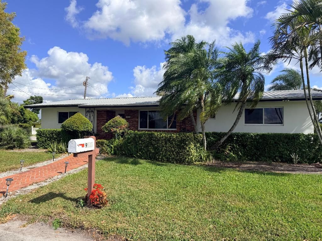 Photo of 955 NW 4th St, Belle Glade, FL 33430 (MLS # R11158700)