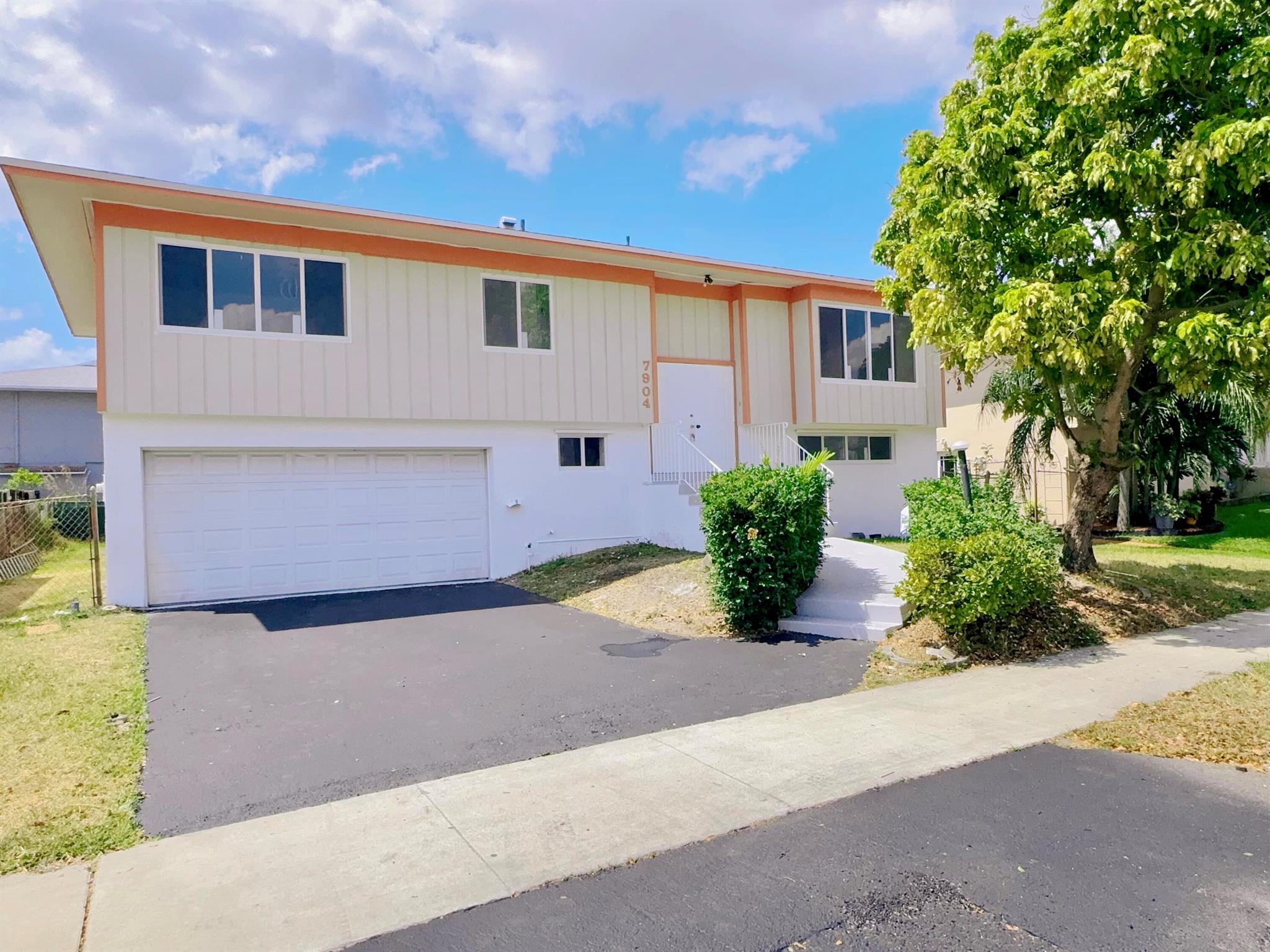 Welcome home to this completely renovated 4/3 home PLUS a DEN/Office. Brand new roof and hurricane impact windows and sliding doors in 2024. One brand new AC unit. Brand new renovation with luxury tile and vinyl flooring throughout. Custom high end cabinets and largest island in the neighborhood makes this a dream house for cooks and entertainment.. Custom vent hood and brand new stainless steel appliances. Three brand new bathrooms with quartz countertops and large frameless rain showers. Brand new paint inside and out. Brand new washer and dryer. Custom LED lighting fixtures throughout. Garage floor re-finished. Large fenced in backyard. The list goes on. This is a must see! Conveniently located in Davie, minutes away from shopping, dining and the Hard Rock Casino.