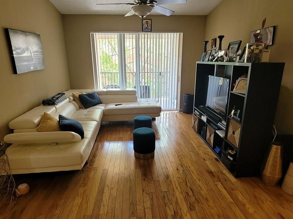 Photo of 8020 N NOB HILL RD #8-304, Tamarac, FL 33321 (MLS # F10284851)