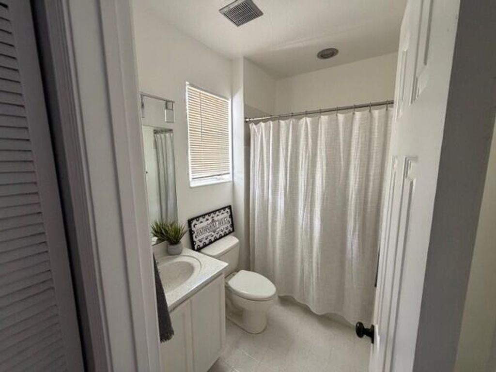 Photo of 3013 Laurel Ridge Circle, Riviera Beach, FL 33404 (MLS # B26001225)