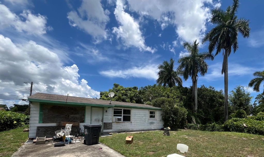 Photo of 3267 Hurricane Drive, Lake Worth, FL 33462 (MLS # R11107081)