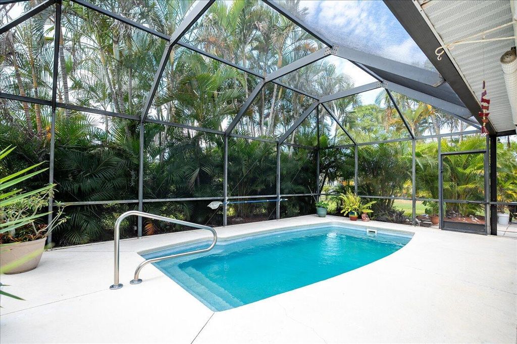 Photo of 2548 SE Appleby Street, Port Saint Lucie, FL 34952 (MLS # R10965626)