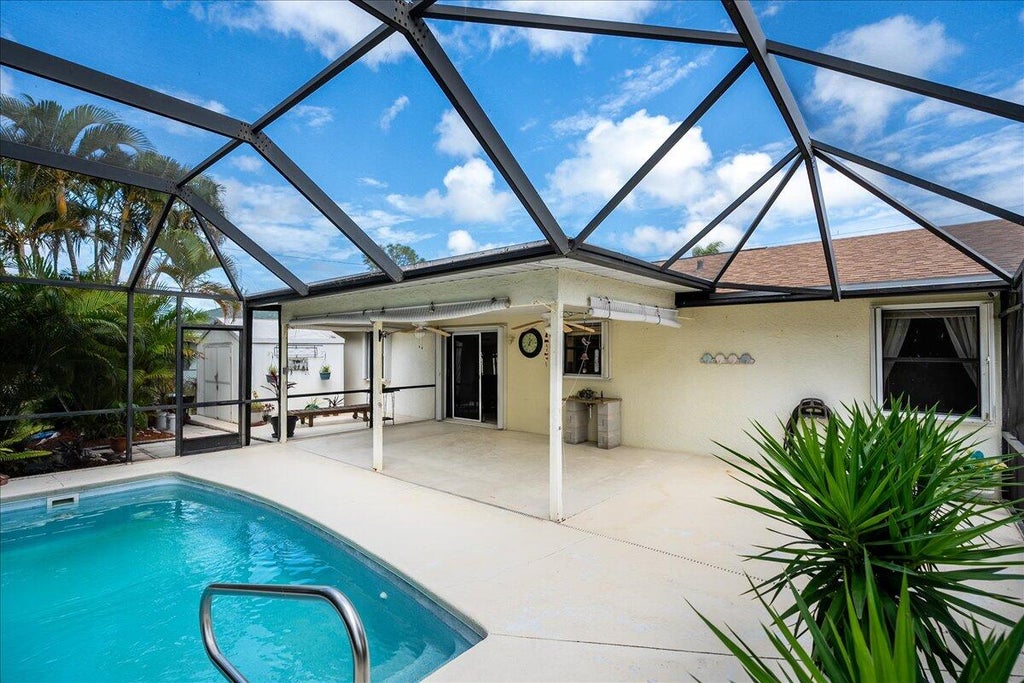 Photo of 2548 SE Appleby Street, Port Saint Lucie, FL 34952 (MLS # R10965626)