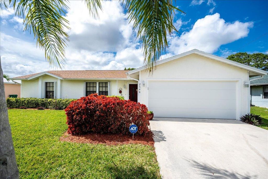Photo of 2548 SE Appleby Street, Port St Lucie, FL 34952 (MLS # R10965626)