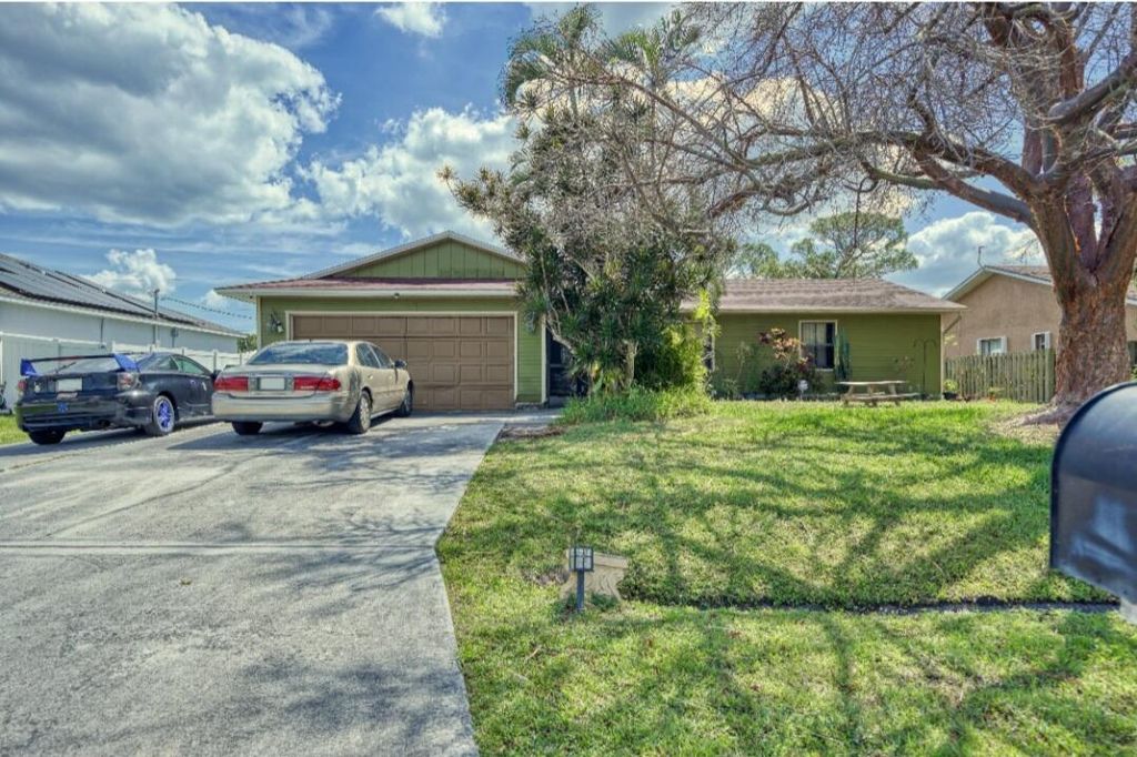 Photo of 1173 SW Granadeer Street SW, Port Saint Lucie, FL 34983 (MLS # R10973919)