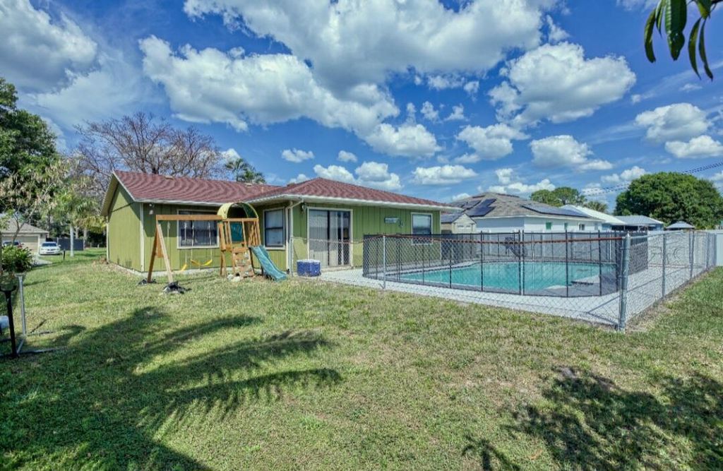 Photo of 1173 SW Granadeer Street SW, Port Saint Lucie, FL 34983 (MLS # R10973919)