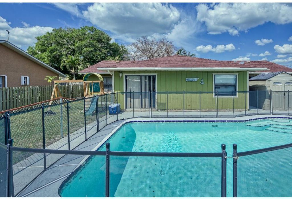 Photo of 1173 SW Granadeer Street SW, Port Saint Lucie, FL 34983 (MLS # R10973919)