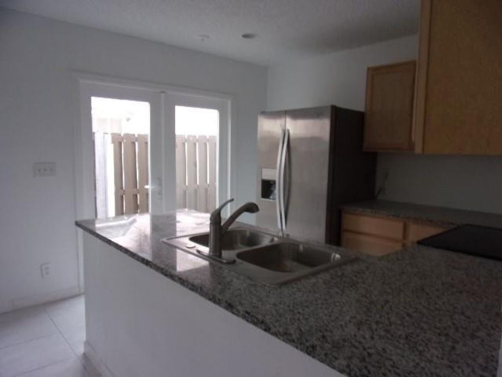 Photo of 80 Pheasant Run Boulevard, West Palm Beach, FL 33415 (MLS # F10538759)