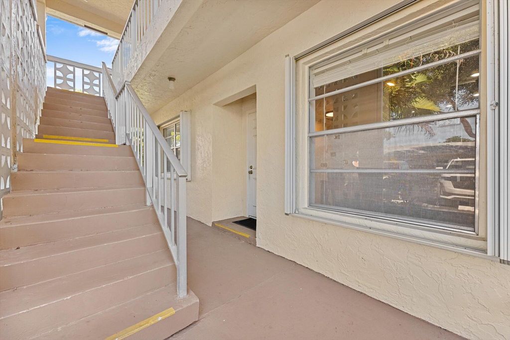 Photo of 1560 NW 18th Avenue #101, Delray Beach, FL 33445 (MLS # R11096973)
