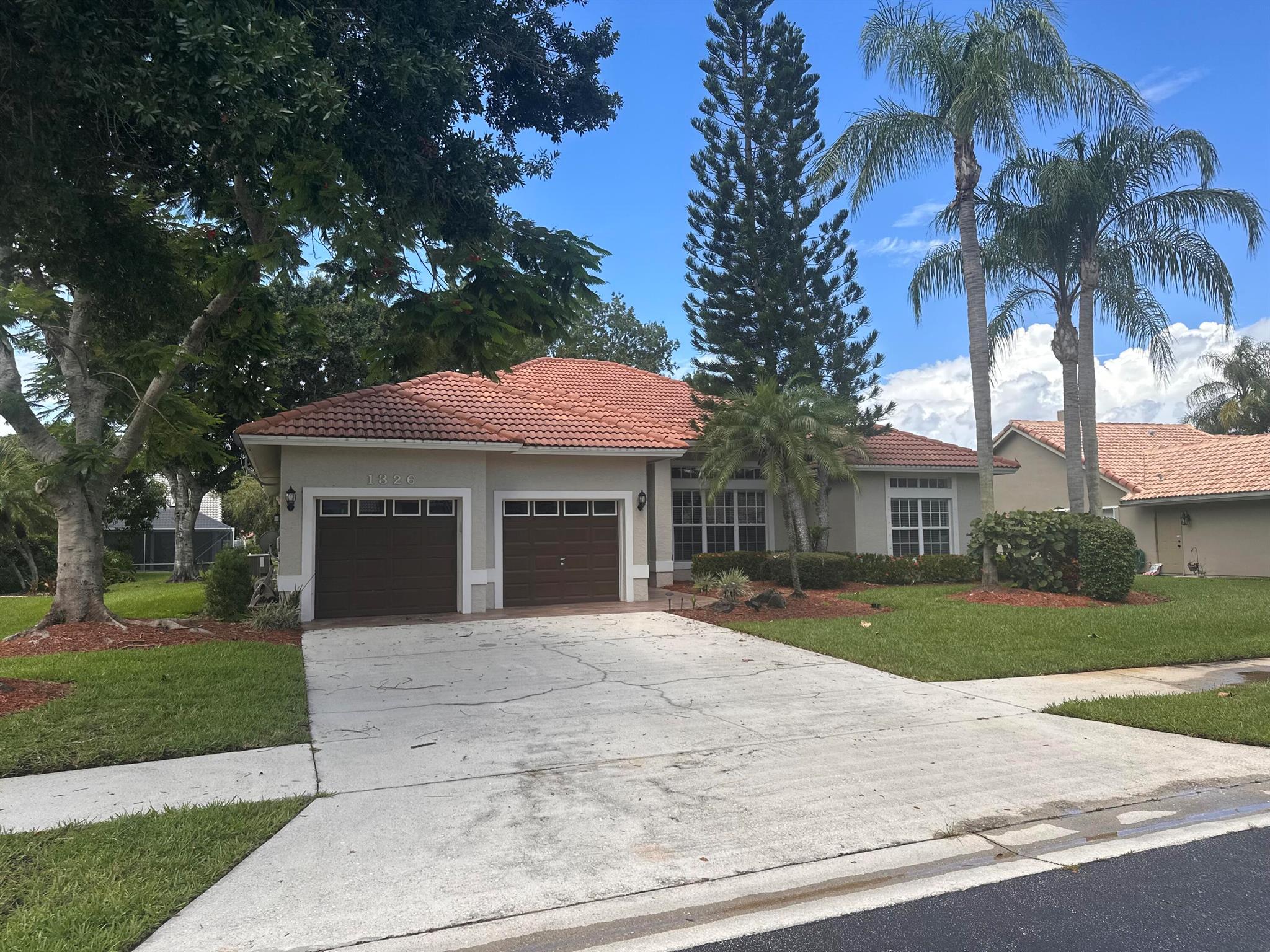 Bright and airy 4 bedroom, 2 bath, 2 car garage, screened in pool home complete with a safety gate. Spacious custom floor plan, high ceilings, meticulously kept with gas stove and fireplace. Beautifully landscaped home in the desirable Heatherwood gated community with side walks, lake, park and pavilion in the heart of St. Lucie West where shopping, dining, schools and major roads are all moments away. Cable, internet, included Don't miss out on this beautiful home. This home is available for a 9 to 12 month lease 1st and Security Credit/background check HOA approval and application