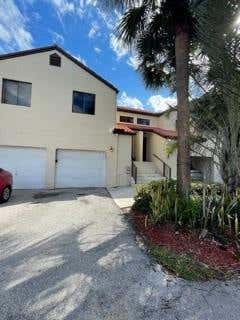 Photo of 12 Via De Casas Sur #203, Boynton Beach, FL 33426 (MLS # F10302436)